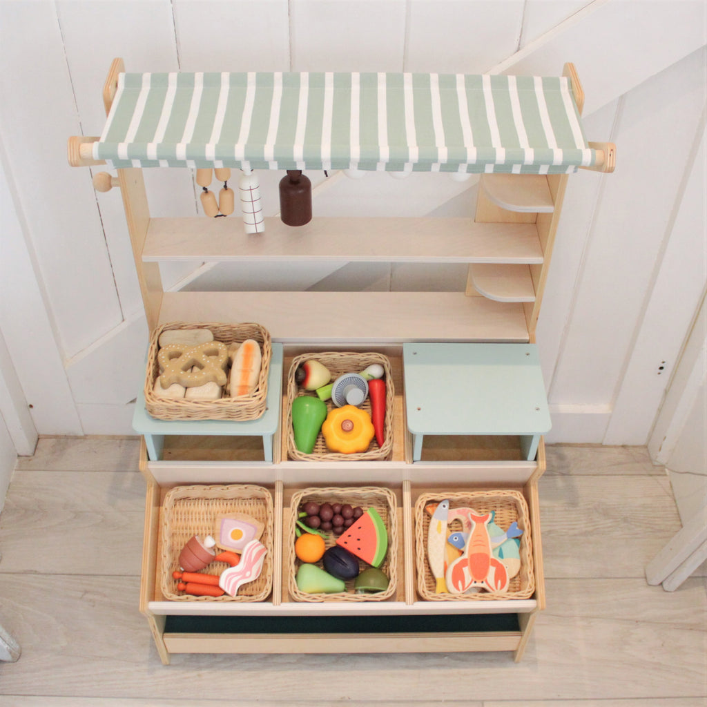 A hand crafted wicker basket with croissant, iced bun, pretzel, baguette and 4 pull apart bread rolls for sharing.  Part of our Market day Range and an accessory to our gorgeous General Stores market stand