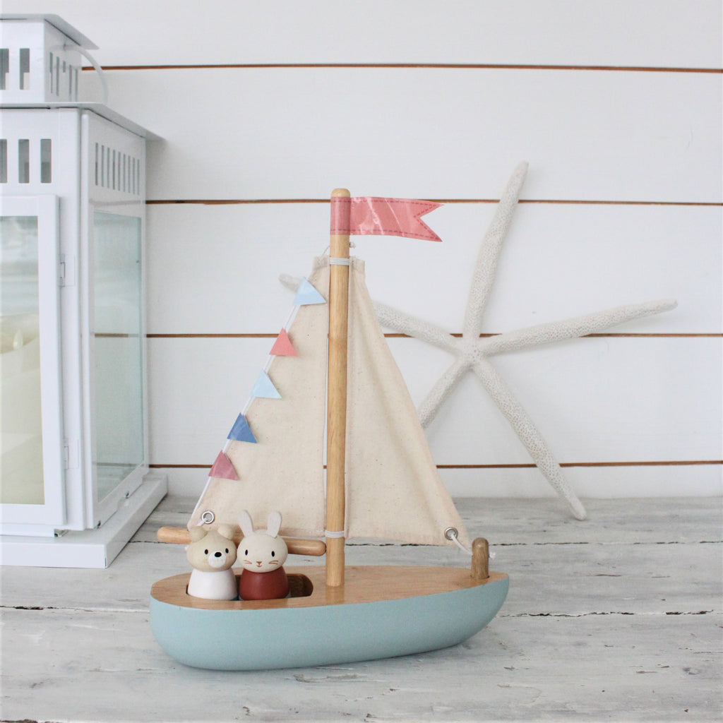 Tender Leaf wood toy plastic free boat with bubble and squeak characters perfect for open ended play and montessori dolls house accessories