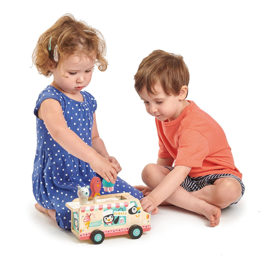 Tender Leaf Toys wooden gelato ice cream van driven by a couple of pesky penguins