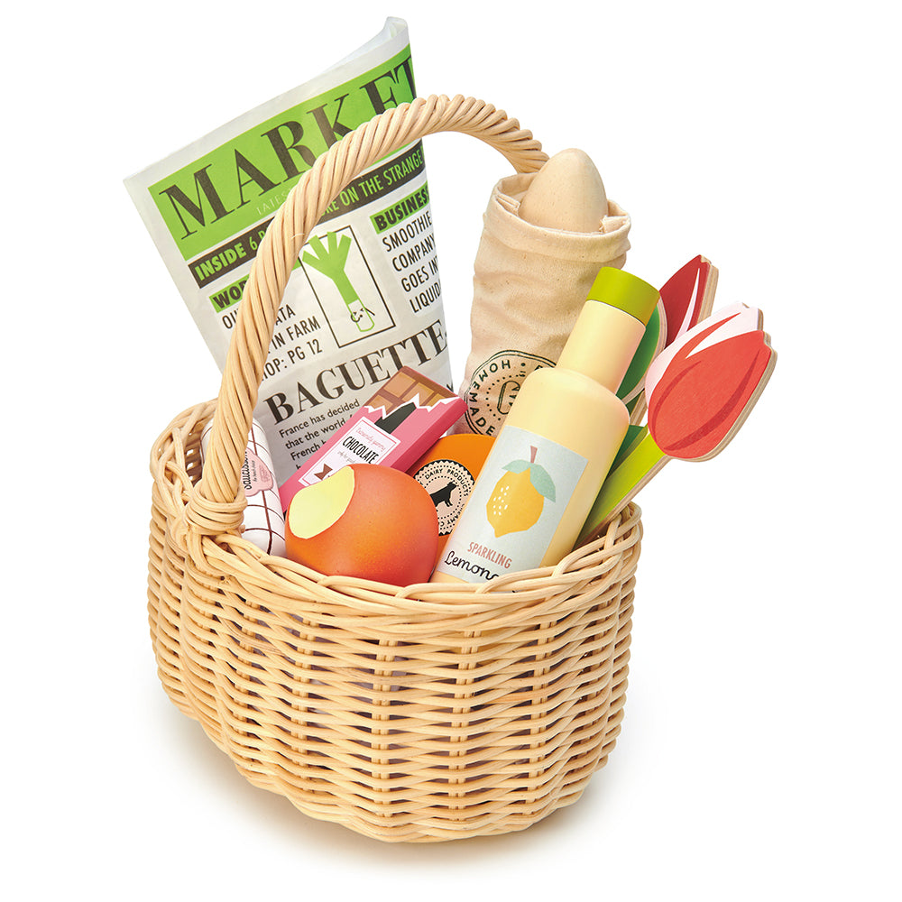 Tender Leaf wooden shopping wicker basket pretend play food set for children with newspaper, apple, lemonade chocolate flowers tulips and some cheese