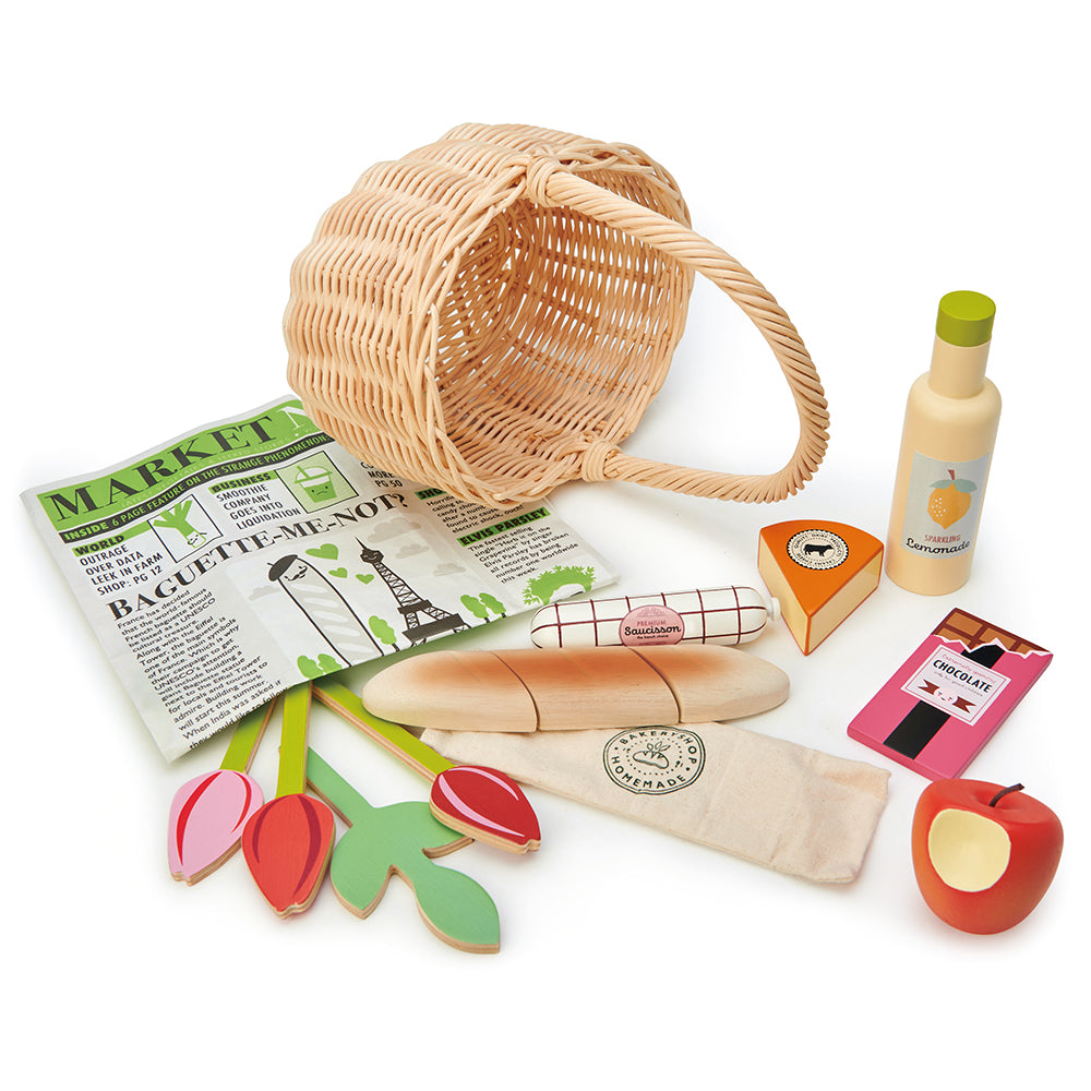 Tender Leaf wooden shopping wicker basket pretend play food set for children with newspaper, apple, lemonade chocolate flowers tulips and some cheese