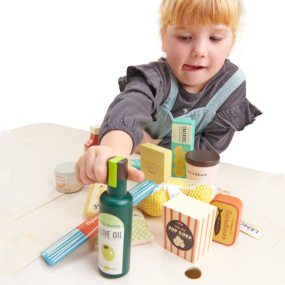 Tender Leaf wooden play food set for children with olive oil ketchup crackers cheese cat food ice cream sardines spaghetti pop corn peas lemons tinned peaches and cheese