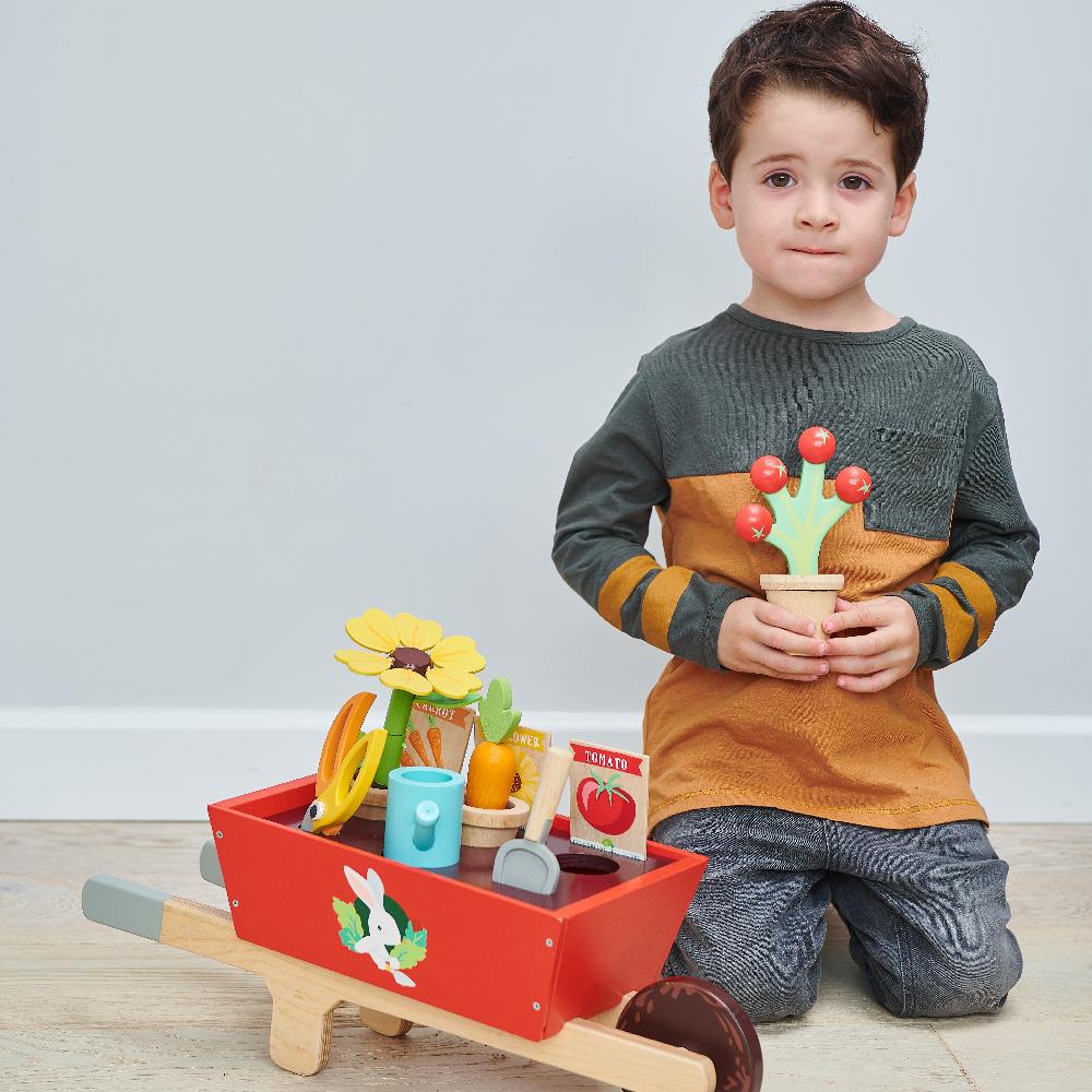 Tender Leaf wooden toy garden wheelbarrow with flowers