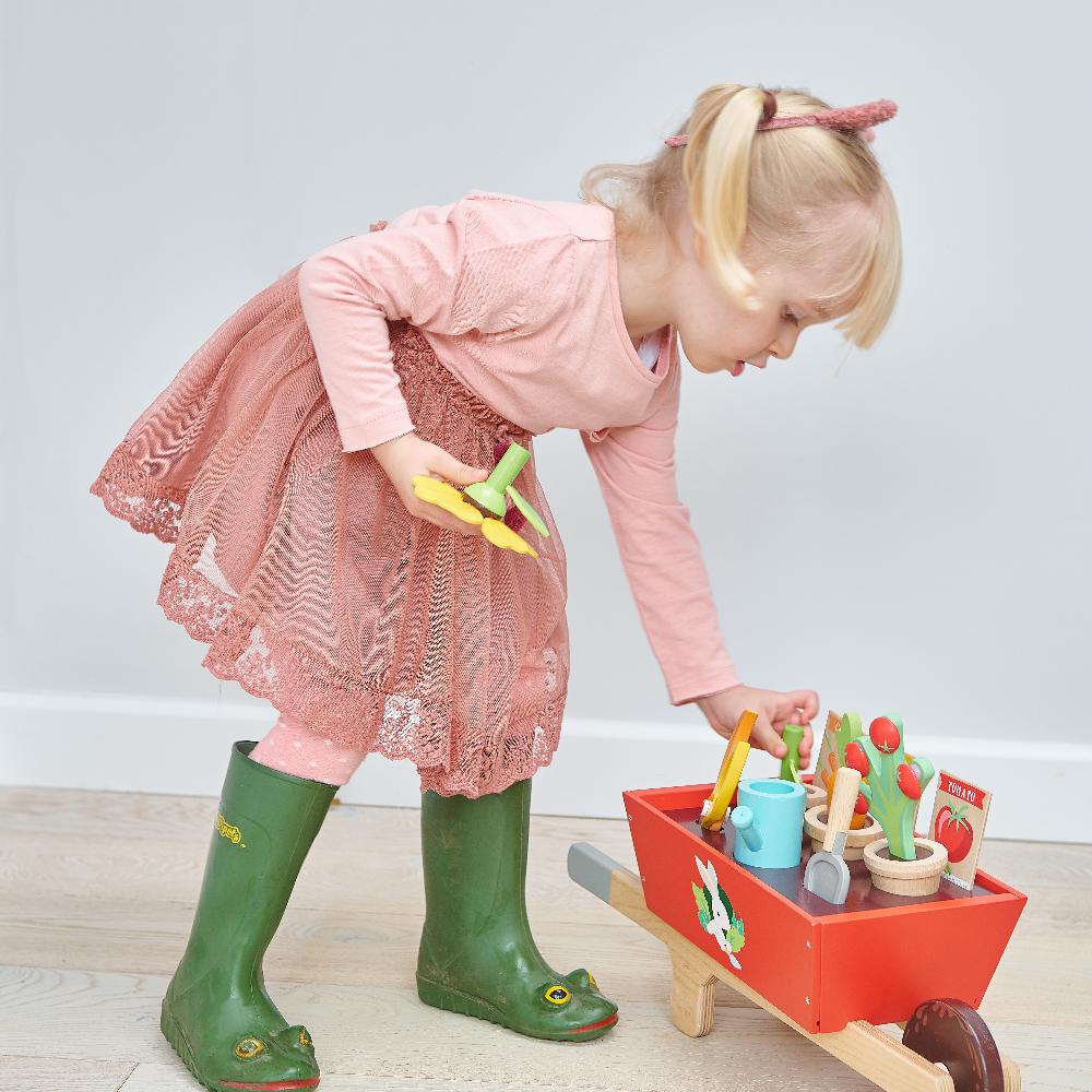 Tender Leaf wooden toy garden wheelbarrow with flowers