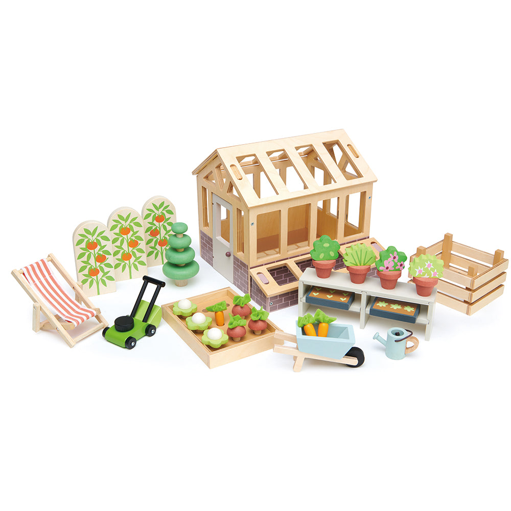 tender leaf toys wood greenhouse garden set for children dolls house extension pack with vegetable patch flowers lawnmower watering can seed tray and an opening door. a perfect addition to your dollies.