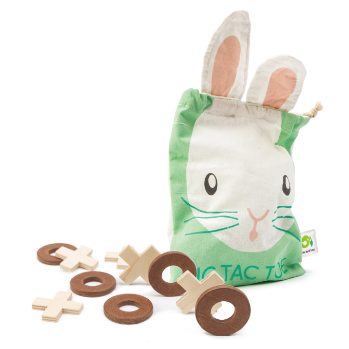 Tender Leaf Toys wooden tic tac toe game with 5 wooden crosses and 5 wooden circles and a bunny drawstring bag