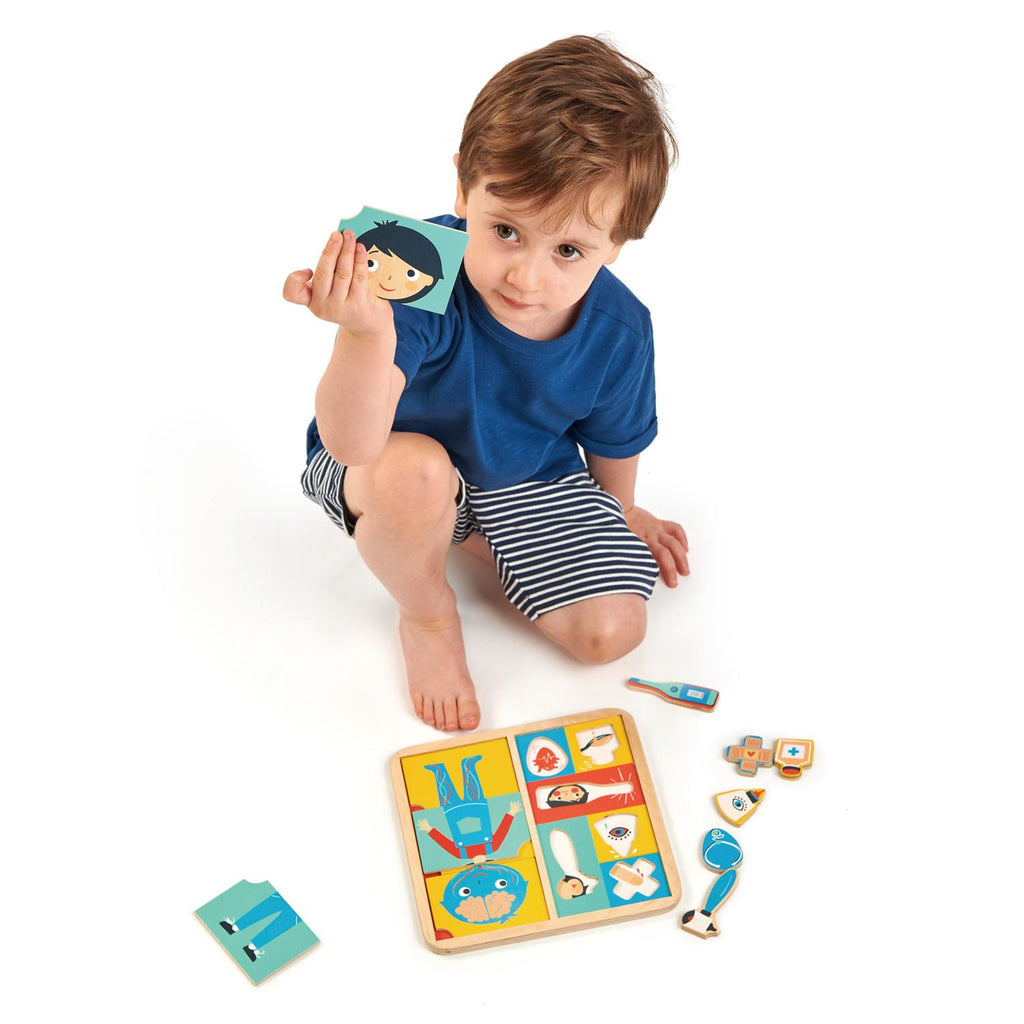 Tender Leaf Wooden toys puzzle with 12 pieces that teaches and explores how the body is made up