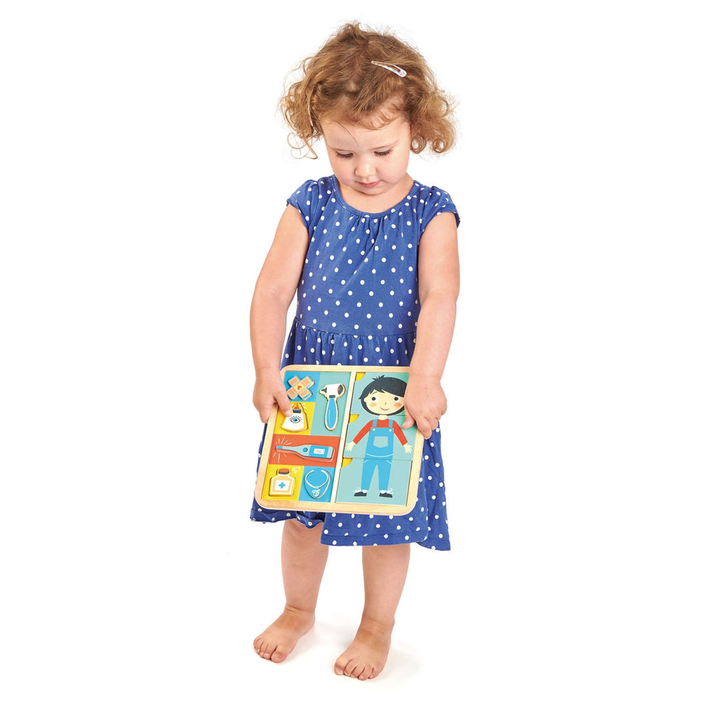 Tender Leaf Wooden toys puzzle with 12 pieces that teaches and explores how the body is made up