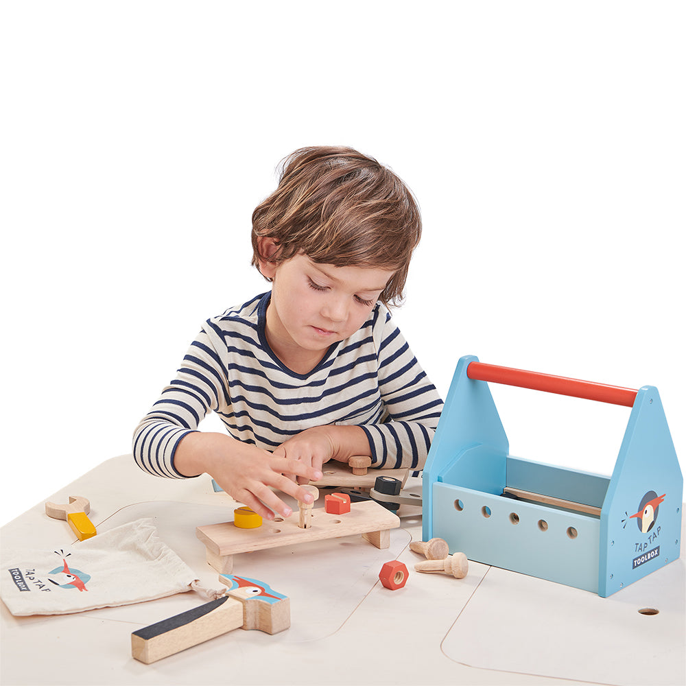 A plastic free tool box toy for children in blue with lots of accessories including hammer wooden nails nuts bolts and screws lets your child play creatively