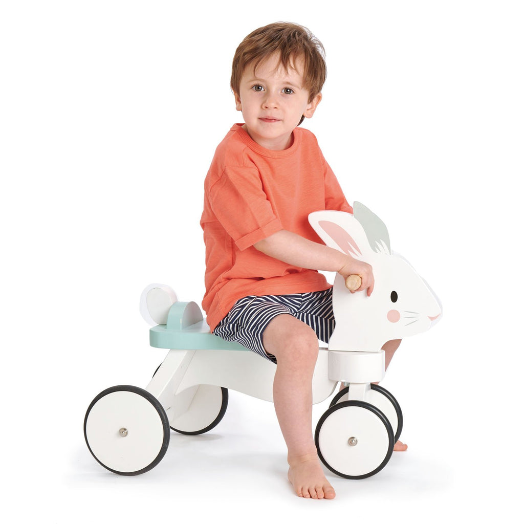 Tender Leaf wooden animal ride on toy for toddlers in white