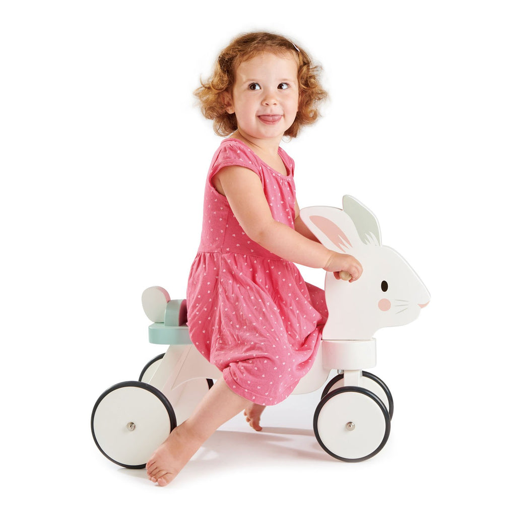 Tender Leaf wooden animal ride on toy for toddlers in white