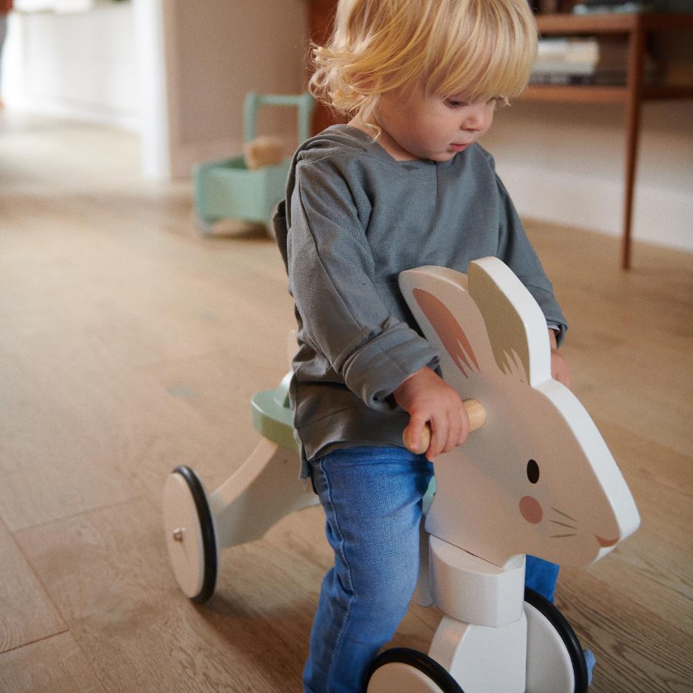 Tender Leaf wooden animal ride on toy for toddlers in white