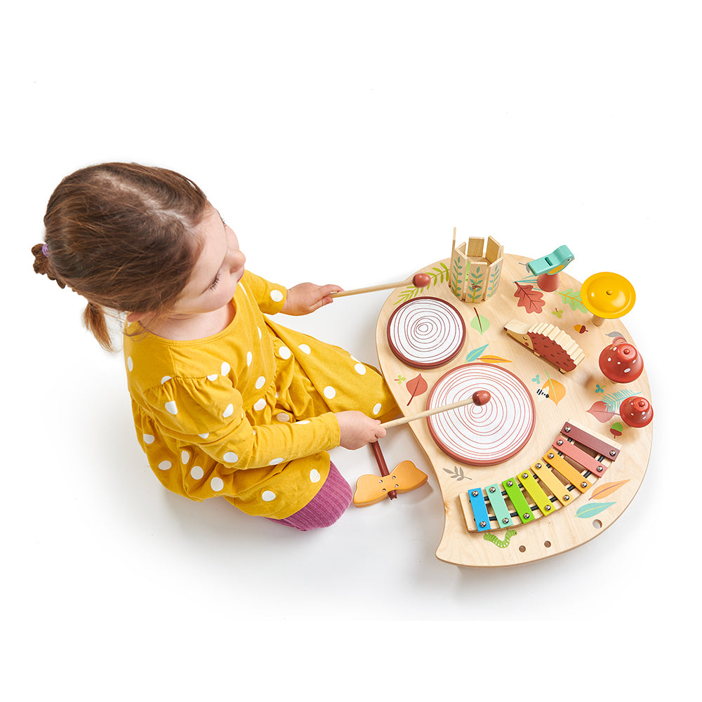 Tenderleaf wooden music tray table for children with drums bells and lots of accessories. Woodland rainbow theme