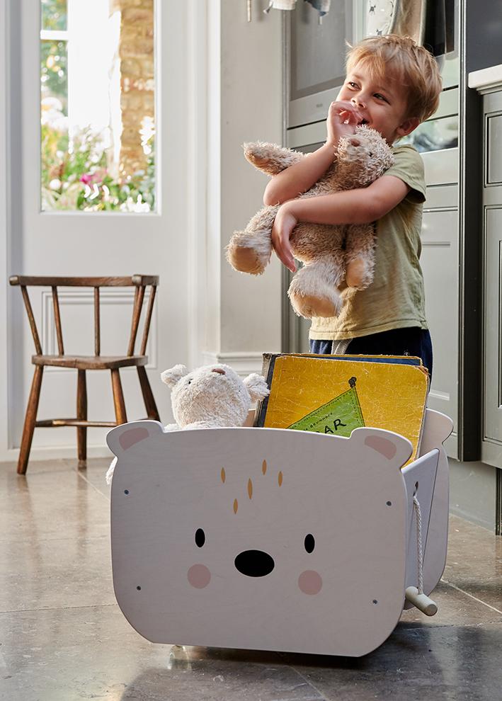 Tender Leaf Toys wooden box on 4 wheels in white