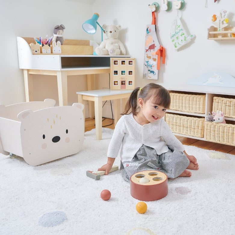 A plastic-free wood desk and chair for children for art and craft activities or homework includes pencil pot holders with animal faces