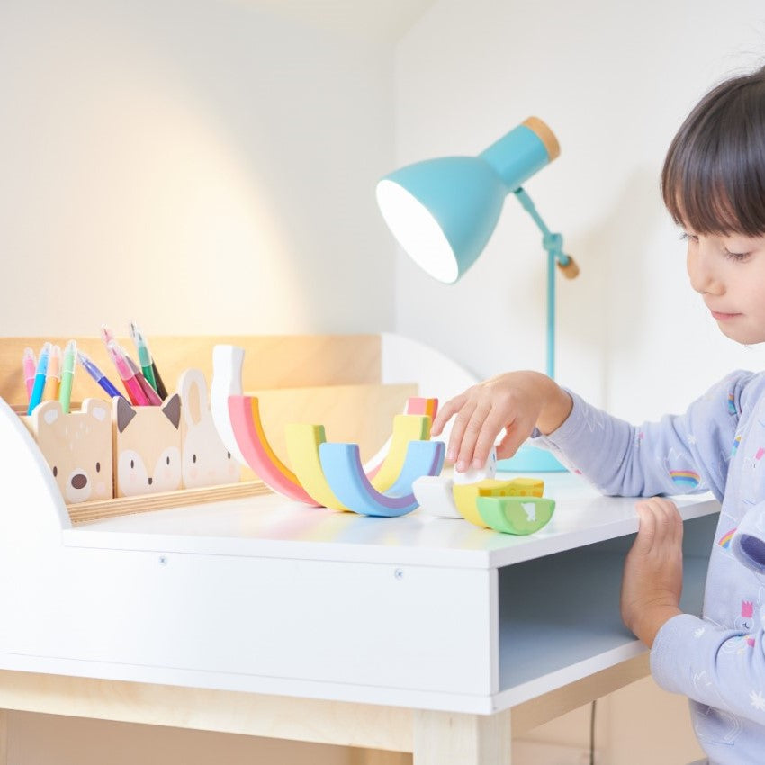 A plastic-free wood desk and chair for children for art and craft activities or homework includes pencil pot holders with animal faces