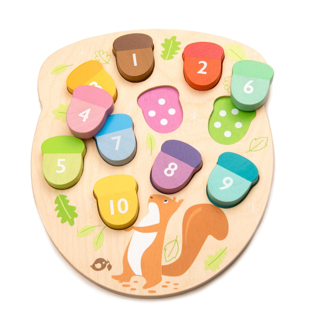 Tender Leaf Toys wooden counting game to educate toddlers. 10 numbered acorn puzzle pieces designed for child development and learning through play