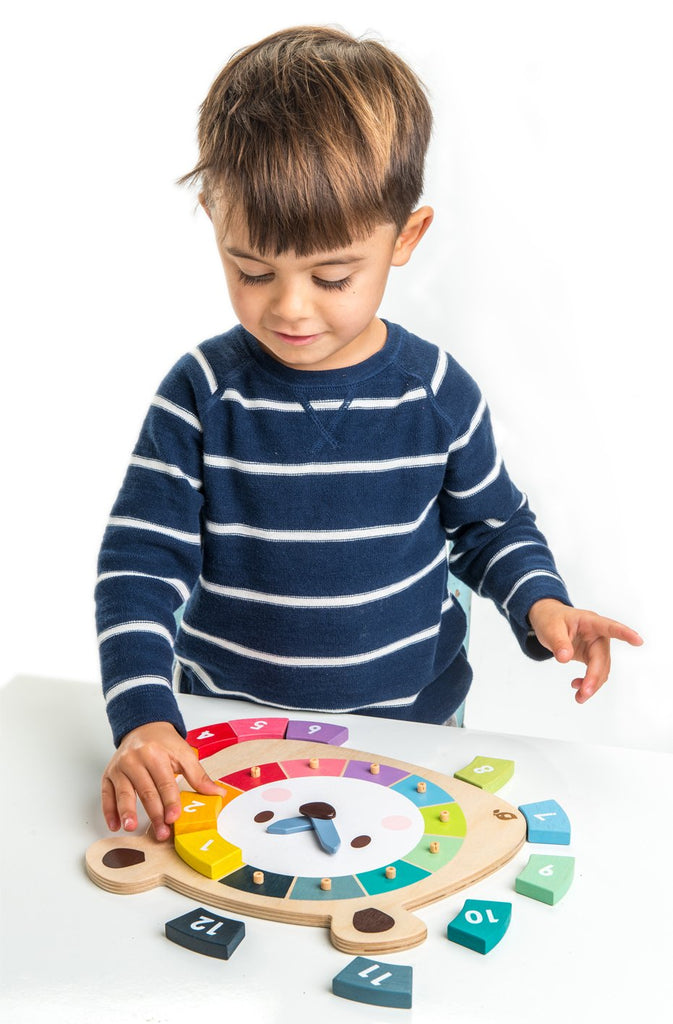 Tender Leaf Toys wooden educational clock and colour game with 2 brightly coloured wooden number blocks