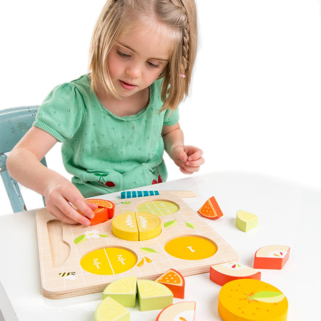 Tender Leaf Toys wooden 16 piece puzzle and knife to learn all about fractions